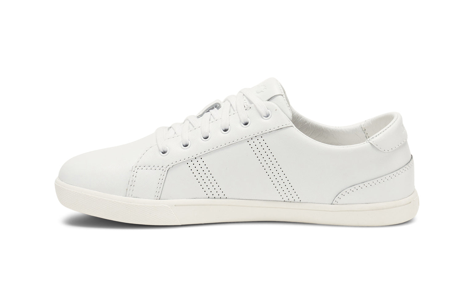 Xero Shoes Canada, specifically women’s barefoot shoes Canada. These minimalist shoes have flexible soles, wide toe boxes, and zero drop. Side view of Women's Dillon Leather in White. A classic leather sneaker. 