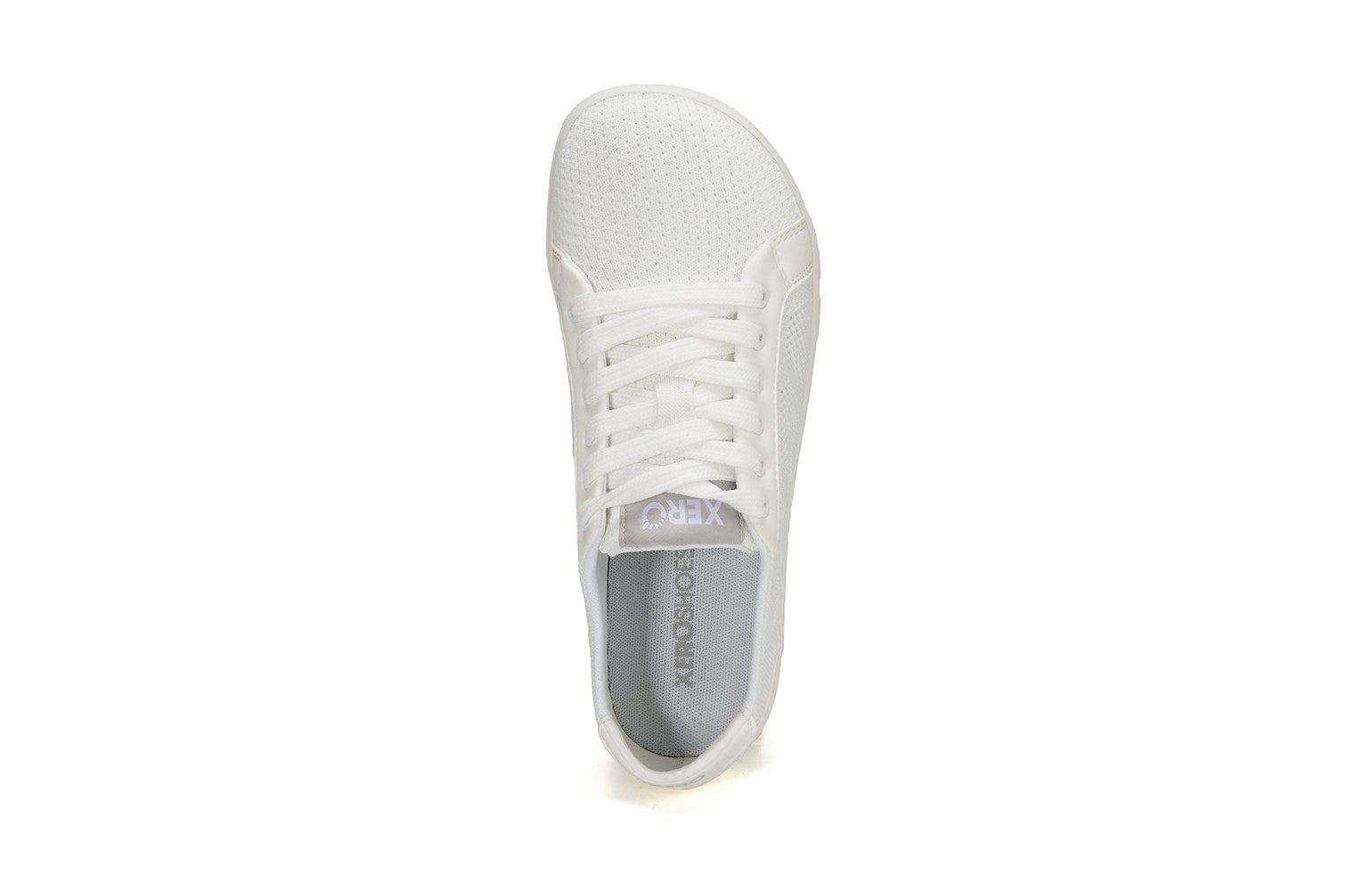 Xero Shoes Canada, specifically women’s barefoot shoes Canada. These minimalist shoes have flexible soles, wide toe boxes, and zero drop. Top view of Xero Women's Dillon in White. Classic, casual sneaker