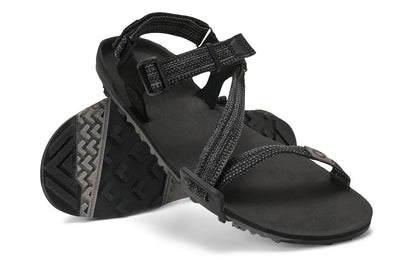 Xero Shoes Canada, specifically men’s barefoot shoes Canada. These minimalist shoes have flexible soles, wide toe boxes, and zero drop. Angled pair view of Xero Men's Z-Trail EV in Multi-Black. Trail hiking, running, and recovery sandal. 