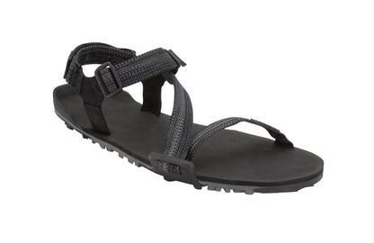 Xero Shoes Canada, specifically women’s barefoot shoes Canada. These minimalist shoes have flexible soles, wide toe boxes, and zero drop. Angled view of Xero Women's Z-Trail EV in Multi-Black. Trail hiking, running, and recovery sandal. 