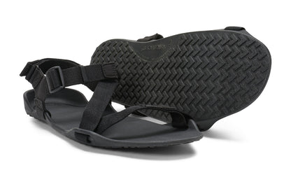 Xero Shoes Canada, specifically men’s barefoot shoes Canada.These minimalist shoes have flexible soles, wide toe boxes, and zero drop. Pair view of Xero Men's Z-Trek in Black, a lightweight packable sport sandal. 