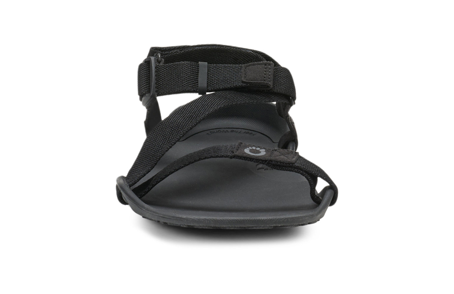 Xero Barefoot Shoes sold in Ontario, Canada. These minimalist shoes have flexible soles, wide toe boxes, and zero drop. Front view of Xero Men's Z-Trek in Black, a lightweight packable sport sandal. 