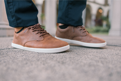 Xero Shoes Canada, specifically men’s barefoot shoes Canada. Man wearing Glenn with black pants