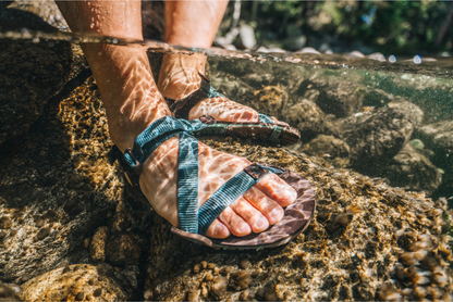 Xero Shoes Canada, specifically men’s barefoot shoes Canada. Man wearing Z-Trail in the water