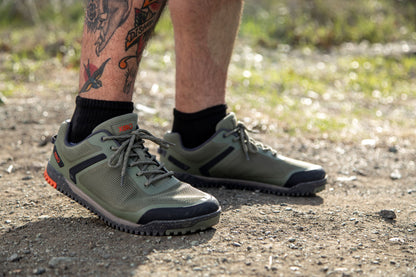 Xero Shoes Canada, specifically barefoot hiking shoes Canada. Man wearing Ridgeway Mesh Low on gravel