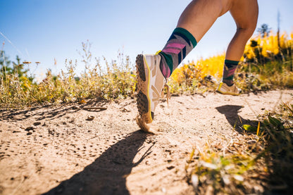 Xero Shoes Canada, specifically barefoot hiking shoes Canada. Woman wearing Scrambler Low EV while trail running