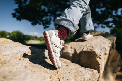 Xero Shoes Canada, specifically women’s barefoot shoes Canada. Woman wearing Wynn with jeans outdoors